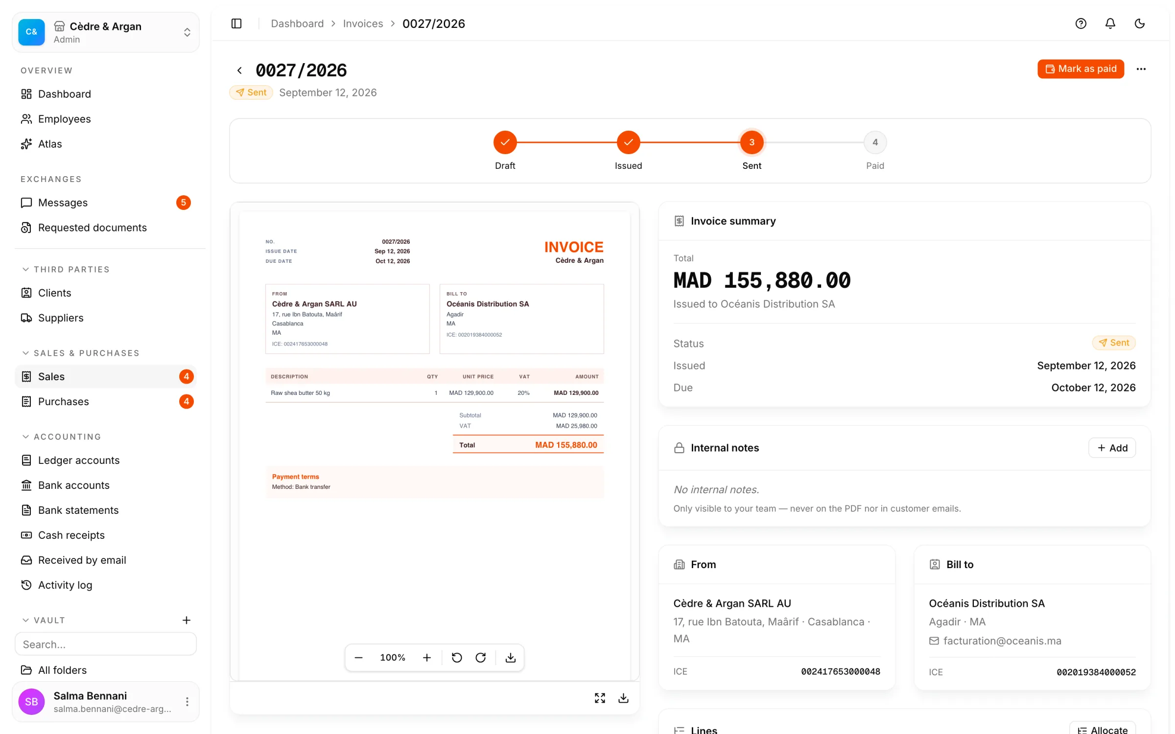 An issued sales invoice in detail: its PDF, its draft → issued → sent → paid lifecycle, and its lines with their chart-of-accounts allocation.