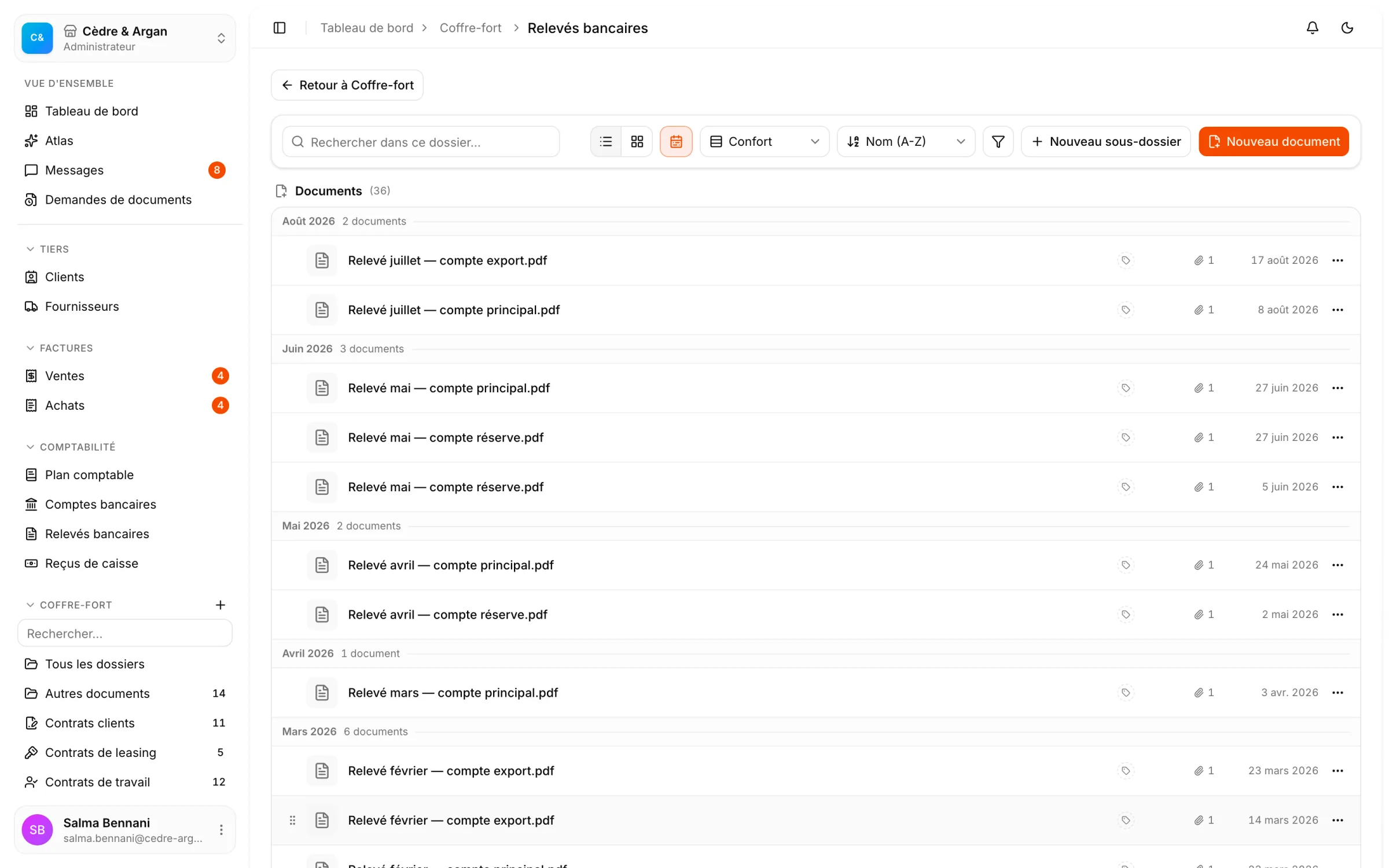 Le dossier Relevés bancaires du coffre-fort, ses relevés PDF groupés par mois avec leur date d'archivage.