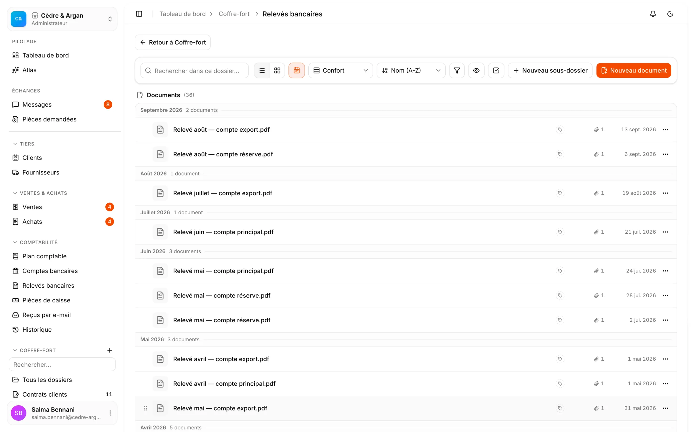 Le dossier Relevés bancaires du coffre-fort, ses relevés PDF groupés par mois avec leur date d'archivage.